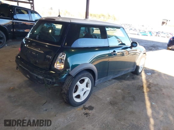 2002 MINI Hardtop with VIN WMWRC33472TC34913, listed as a IAAI auction lot 41599382 with 150,177 mi miles and . Bid and sale history available at DreamBid. Image 4.