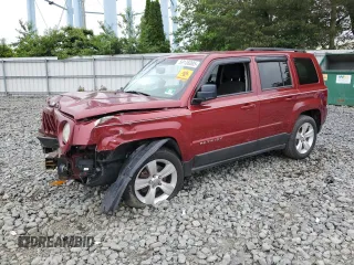 2016 Jeep Patriot Latitude z VIN 1C4NJPFAXGD792415, wystawiony jako Copart lot #59136005 z przebiegiem Nie podano mil oraz Szkoda całkowita • Salvage title. Historia ofert i sprzedaży dostępna na DreamBid. Obrazek 1.