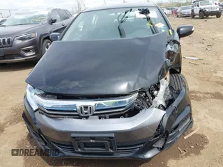 2014 Honda Insight EX z VIN JHMZE2H75ES001709, wystawiony jako IAAI lot #42086181 z przebiegiem 103 045 mil mil oraz . Historia ofert i sprzedaży dostępna na DreamBid. Obrazek 12.