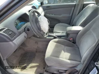 2002 Toyota Camry XLE z VIN 4T1BF32K02U034535, wystawiony jako Copart lot #53894995 z przebiegiem 253 037 mil mil oraz Szkoda całkowita • Salvage title. Historia ofert i sprzedaży dostępna na DreamBid. Obrazek 7.