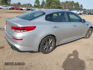 2020 Kia Optima LX with VIN 5XXGT4L34LG439434, listed as a IAAI auction lot 41743129 with 77,409 mi miles and . Bid and sale history available at carsss.com. Image 4.