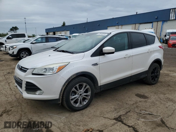 2014 Ford Escape SE z VIN 1FMCU9G96EUD93590, wystawiony jako Copart lot #57810015 z przebiegiem 146 919 mil mil oraz Czysty tytuł • Clean title. Historia ofert i sprzedaży dostępna na DreamBid. Obrazek 1.