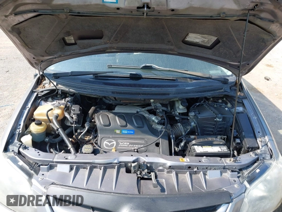 2004 Mazda MPV LX with VIN JM3LW28AX40500247, listed as a IAAI auction lot 42545659 with 255,316 mi miles and . Bid and sale history available at DreamBid. Image 10.