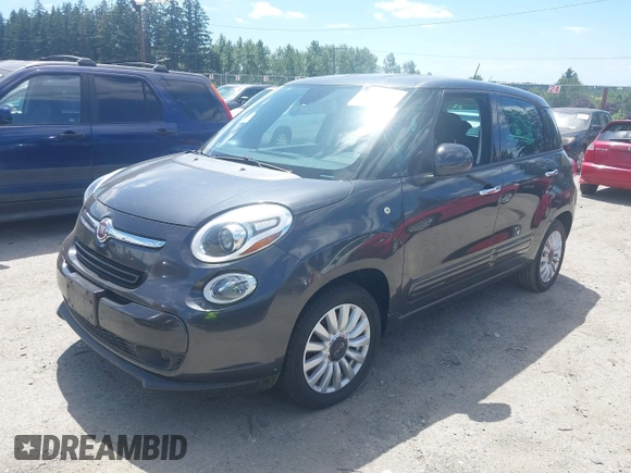 2014 FIAT 500L Easy with VIN ZFBCFABH0EZ028102, listed as a IAAI auction lot 42721149 with 115,137 mi miles and . Bid and sale history available at DreamBid. Image 2.