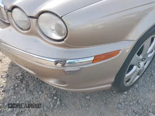 2004 Jaguar X-Type z VIN SAJEA51C84WD82052, wystawiony jako IAAI lot #42240141 z przebiegiem 50 631 mil mil oraz . Historia ofert i sprzedaży dostępna na DreamBid. Obrazek 14.