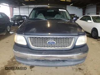 2000 Ford F-150 XL with VIN 1FTZX172XYKA45382, listed as a Copart auction lot 43668575 with 210,735 mi miles and Clean Title. Bid and sale history available at carsss.com. Image 5.