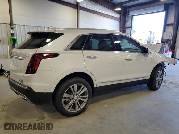 2025 Cadillac XT5 FWD Premium Luxury with VIN 1GYKNCRSXSZ106707, listed as a Copart auction lot 86919854 with 1,879 mi miles and Salvage Title. Bid and sale history available at DreamBid. Image 3.