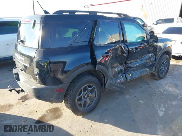 2021 Ford Bronco Sport Badlands z VIN 3FMCR9D92MRB30167, wystawiony jako IAAI lot #41313354 z przebiegiem 53 367 mil mil oraz . Historia ofert i sprzedaży dostępna na DreamBid. Obrazek 4.