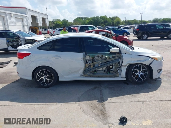 2016 Ford Focus SE with VIN 1FADP3F2XGL356462, listed as a IAAI auction lot 41941656 with 85,904 mi miles. Bid and sale history available at carsss.com. Image 13.