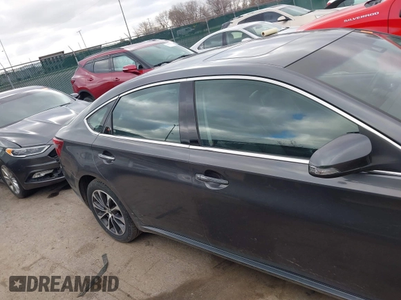 2018 Toyota Avalon XLE with VIN 4T1BK1EB9JU275097, listed as a IAAI auction lot 41940585 with 119,854 mi miles and . Bid and sale history available at DreamBid. Image 13.