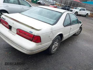 1997 Ford Thunderbird LX with VIN 1FALP62W6VH124267, listed as a IAAI auction lot 41439934 with 242,914 mi miles and . Bid and sale history available at DreamBid. Image 4.