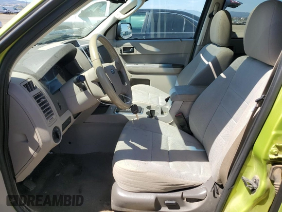 2012 Ford Escape XLT z VIN 1FMCU0D74CKA12634, wystawiony jako Copart lot #56332815 z przebiegiem 149 390 mil mil oraz Szkoda całkowita • Salvage title. Historia ofert i sprzedaży dostępna na DreamBid. Obrazek 7.