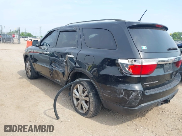 2013 Dodge Durango Crew z VIN 1C4RDJDG3DC685995, wystawiony jako IAAI lot #42490067 z przebiegiem 205 806 mil mil oraz . Historia ofert i sprzedaży dostępna na DreamBid. Obrazek 3.