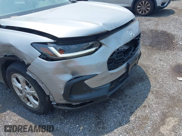 2023 Honda HR-V LX with VIN 3CZRZ1H34PM723904, listed as a IAAI auction lot 42473267 with 18,181 mi miles and . Bid and sale history available at DreamBid. Image 6.