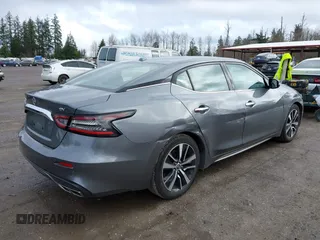 2023 Nissan Maxima SV with VIN 1N4AA6CV4PC512497, listed as a IAAI auction lot 41760990 with 32,400 mi miles and . Bid and sale history available at DreamBid. Image 4.