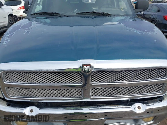 1998 Dodge 1500 z VIN 1B7HF13Y4WJ203422, wystawiony jako IAAI lot #41589831 z przebiegiem 454 838 mil mil oraz . Historia ofert i sprzedaży dostępna na DreamBid. Obrazek 10.