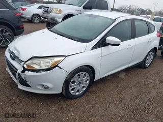 2012 Ford Focus SE with VIN 1FAHP3K20CL197291, listed as a IAAI auction lot 41643107 with 152,421 mi miles. Bid and sale history available at carsss.com. Image 2.