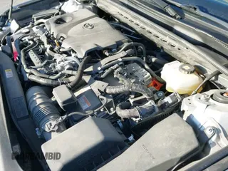 2023 Toyota Camry Hybrid XLE z VIN 4T1F31AK4PU604107, wystawiony jako IAAI lot #41824999 z przebiegiem 52 316 mil mil oraz . Historia ofert i sprzedaży dostępna na DreamBid. Obrazek 19.