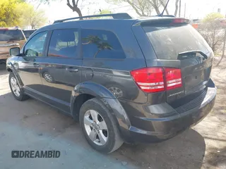 2017 Dodge Journey SE with VIN 3C4PDCAB9HT503979, listed as a IAAI auction lot 42116429 with 176,591 mi miles and . Bid and sale history available at DreamBid. Image 3.