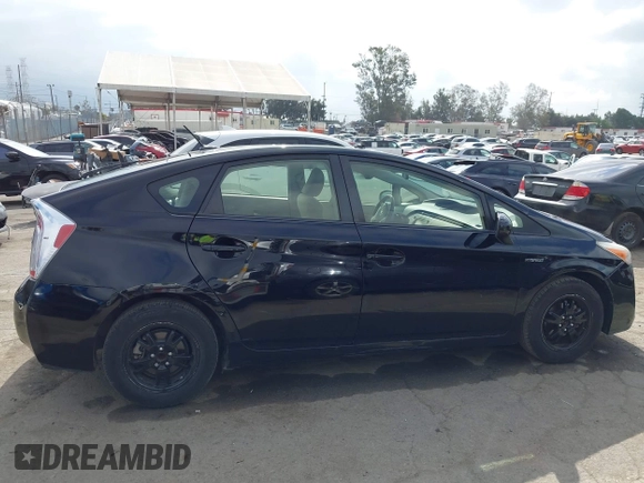 2012 Toyota Prius One with VIN JTDKN3DU8C5485214, listed as a IAAI auction lot 42136855 with 82,355 mi miles. Bid and sale history available at carsss.com. Image 13.