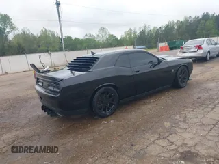 2016 Dodge Challenger R/T Scat Pack z VIN 2C3CDZFJ4GH118973, wystawiony jako IAAI lot #41960654 z przebiegiem 180 315 mil mil oraz . Historia ofert i sprzedaży dostępna na DreamBid. Obrazek 4.