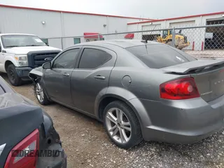 2013 Dodge Avenger SXT with VIN 1C3CDZCB1DN576762, listed as a IAAI auction lot 41938493 with 168,149 mi miles and . Bid and sale history available at carsss.com. Image 14.