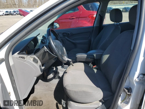 2004 Ford Focus with VIN 3FAFP37Z74R121213, listed as a Copart auction lot 53339645 with 65,590 mi miles and Clean title. Bid and sale history available at DreamBid. Image 7.