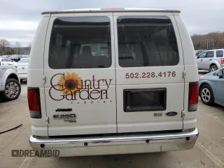 2009 Ford Econoline Passenger XL with VIN 1FBNE31L69DA54219, listed as a Copart auction lot 82971934 with 251,549 mi miles and Salvage title. Bid and sale history available at DreamBid. Image 6.
