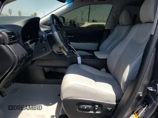 2015 Lexus RX 450h with VIN 2T2ZB1BA1FC001617, listed as a Copart auction lot 61766235 with 79,789 mi miles and Salvage title. Bid and sale history available at DreamBid. Image 7.
