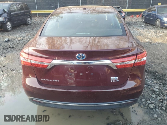 2014 Toyota Avalon Limited z VIN 4T1BD1EB2EU031808, wystawiony jako Copart lot #82397754 z przebiegiem Nie podano mil oraz Szkoda całkowita • Salvage title. Historia ofert i sprzedaży dostępna na DreamBid. Obrazek 6.