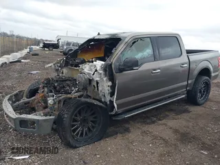2019 Ford F-150 XL with VIN 1FTEW1E57KFB27309, listed as a IAAI auction lot 41847423 with Not provided miles and . Bid and sale history available at DreamBid. Image 2.
