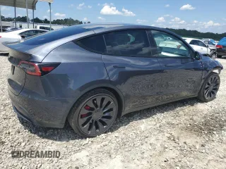 2022 Tesla Model Y Performance with VIN 7SAYGDEF3NF532311, listed as a Copart auction lot 62997535 with 60,530 mi miles and Salvage title. Bid and sale history available at DreamBid. Image 3.