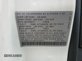2008 Volkswagen Touareg V6 z VIN WVGBE77L08D043577, wystawiony jako Copart lot #50735775 z przebiegiem Nie podano mil oraz Szkoda całkowita • Salvage title. Historia ofert i sprzedaży dostępna na DreamBid. Obrazek 13.