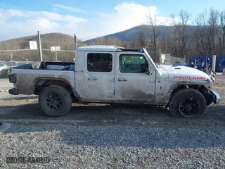 2023 Jeep Gladiator Overland with VIN 1C6HJTFG4PL514441, listed as a IAAI auction lot 41416018 with 56,478 mi miles. Bid and sale history available at carsss.com. Image 12.