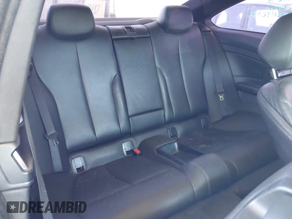 2014 BMW 4 Series 428i with VIN WBA3N7C51EK220125, listed as a IAAI auction lot 41881928 with 129,810 mi miles and . Bid and sale history available at carsss.com. Image 8.