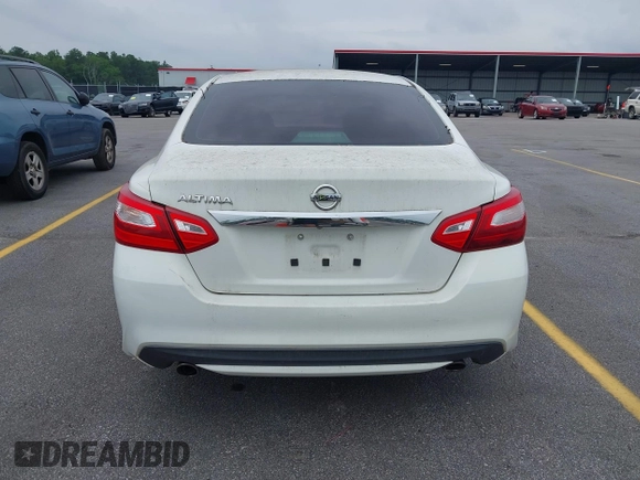 2016 Nissan Altima S z VIN 1N4AL3APXGN345029, wystawiony jako IAAI lot #42359083 z przebiegiem 210 555 mil mil oraz . Historia ofert i sprzedaży dostępna na DreamBid. Obrazek 16.