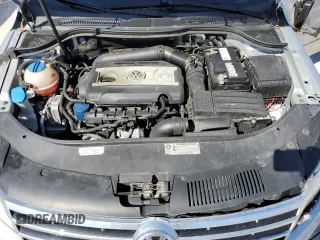 2013 Volkswagen CC R-Line z VIN WVWBN7AN1DE536851, wystawiony jako Copart lot #76972914 z przebiegiem 105 799 mil mil oraz Szkoda całkowita • Salvage title. Historia ofert i sprzedaży dostępna na DreamBid. Obrazek 11.