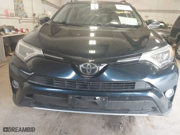 2017 Toyota RAV4 XLE with VIN JTMRFREV6HD208421, listed as a IAAI auction lot 42078130 with 228,365 mi miles. Bid and sale history available at carsss.com. Image 12.