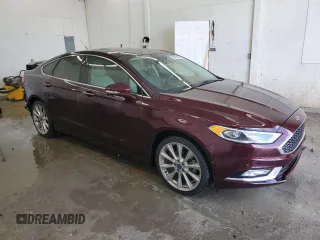 2017 Ford Fusion Titanium with VIN 3FA6P0K9XHR174578, listed as a Copart auction lot 57999305 with 77,657 mi miles and Salvage title. Bid and sale history available at DreamBid. Image 4.