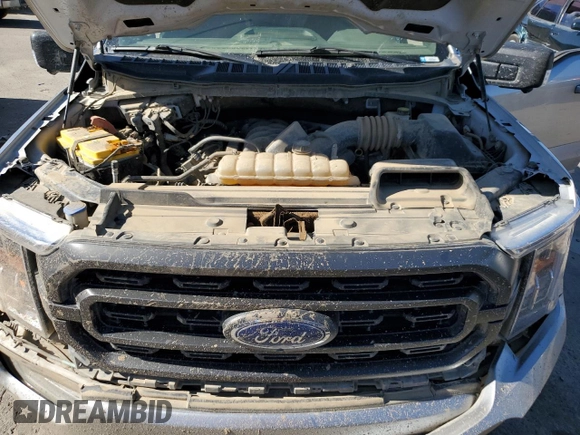 2023 Ford F-150 XL z VIN 1FTFW1E59PFC90622, wystawiony jako Copart lot #66144225 z przebiegiem 95 346 mil mil oraz Szkoda całkowita • Salvage title. Historia ofert i sprzedaży dostępna na DreamBid. Obrazek 11.