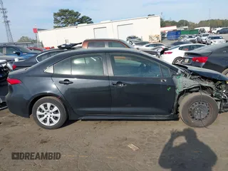 2022 Toyota Corolla LE with VIN JTDEPMAE9NJ209872, listed as a IAAI auction lot 41902891 with 37,479 mi miles and . Bid and sale history available at DreamBid. Image 13.