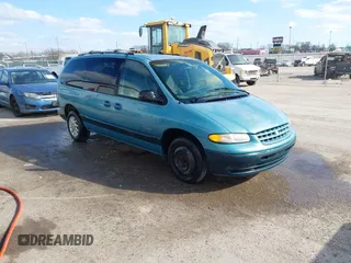 1998 Plymouth Voyager Grand SE z VIN 2P4GP44G4WR654454, wystawiony jako IAAI lot #41736791 z przebiegiem 80 000 mil mil oraz . Historia ofert i sprzedaży dostępna na DreamBid. Obrazek 1.