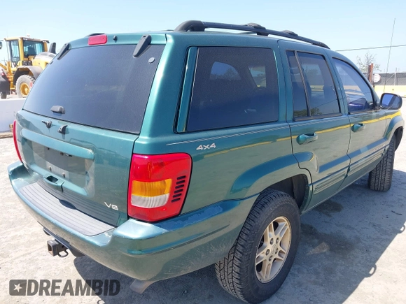 1999 Jeep Grand Cherokee Limited with VIN 1J4GW68N5XC666564, listed as a IAAI auction lot 42117018 with 177,440 mi miles. Bid and sale history available at carsss.com. Image 4.