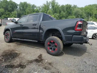 2019 Ram 1500 Rebel with VIN 1C6SRFLT6KN722481, listed as a Copart auction lot 60653285 with 79,447 mi miles and Salvage title. Bid and sale history available at DreamBid. Image 2.