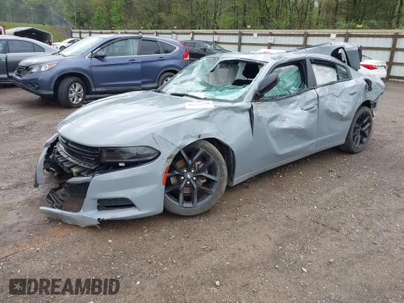 2022 Dodge Charger SXT with VIN 2C3CDXBGXNH145896, listed as a IAAI auction lot 42010378 with 24,561 mi miles and . Bid and sale history available at DreamBid. Image 2.