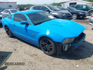 2013 Ford Mustang GT with VIN 1ZVBP8CF1D5265745, listed as a IAAI auction lot 42628336 with 137,296 mi miles and . Bid and sale history available at DreamBid. Image 1.