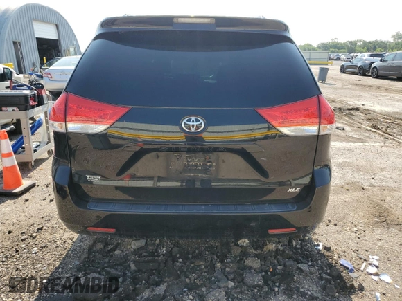 2012 Toyota Sienna XLE AAS with VIN 5TDYK3DC6CS211062, listed as a Copart auction lot 59404205 with Not provided miles and Salvage title. Bid and sale history available at DreamBid. Image 6.