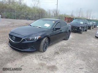 2014 Mazda Mazda6 i Touring with VIN JM1GJ1V68E1128650, listed as a IAAI auction lot 42035713 with 171,609 mi miles. Bid and sale history available at carsss.com. Image 2.