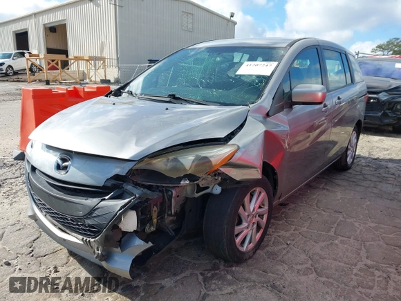 2012 Mazda 5 Sport with VIN JM1CW2BLXC0101310, listed as a IAAI auction lot 41207247 with 146,691 mi miles. Bid and sale history available at carsss.com. Image 6.