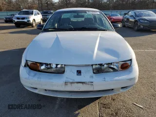 2001 Saturn SL z VIN 1G8ZK52771Z219294, wystawiony jako Copart lot #83155494 z przebiegiem 190 338 mil mil oraz Szkody całkowita. Historia ofert i sprzedaży dostępna na DreamBid. Obrazek 5.
